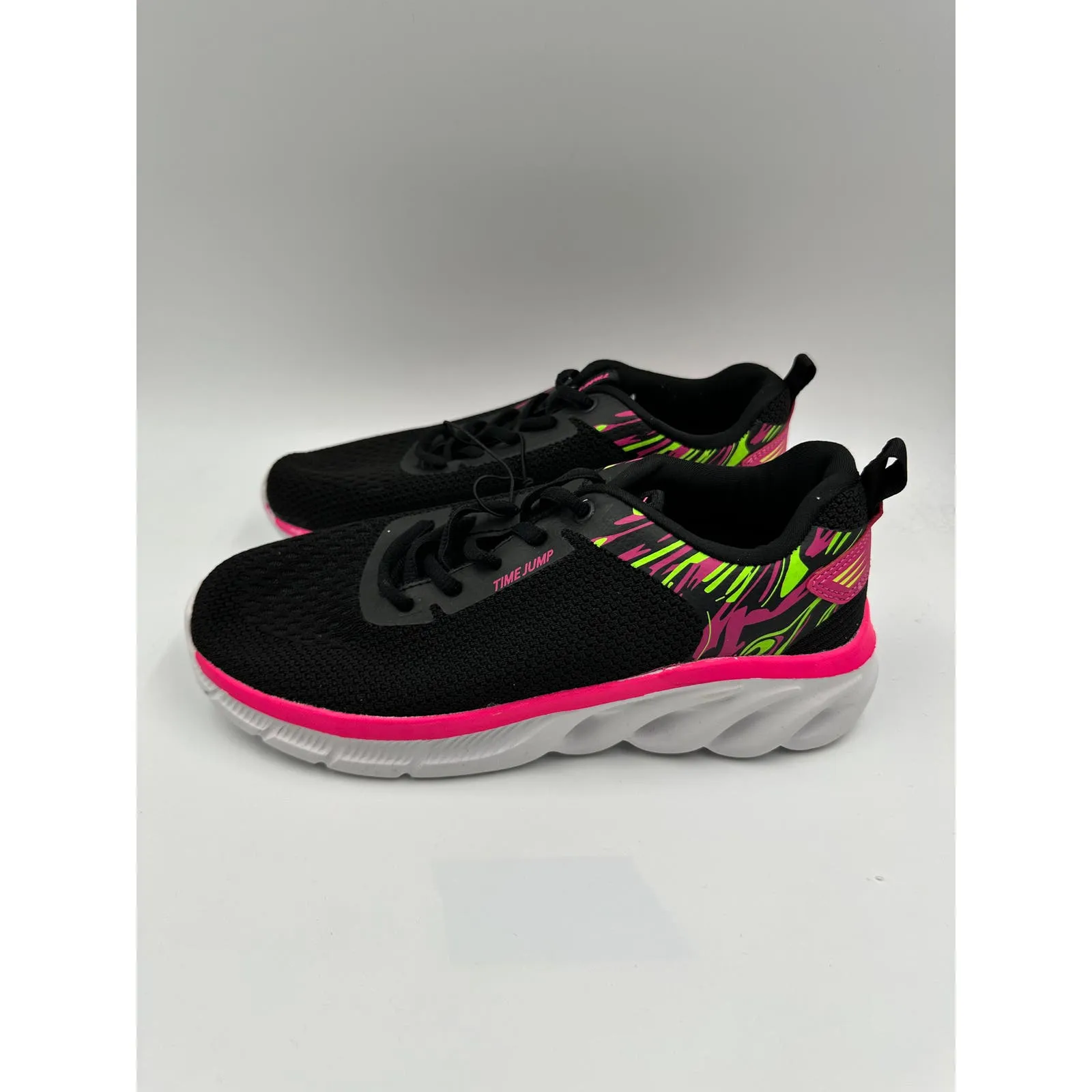 Women's size 8, Black Mesh Sneaker w/ Neon Pink and Green Accents